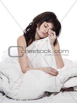 young woman in bed awakening tired insomnia hangover