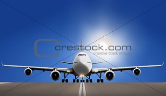 Air plane on runway with bright sun and blue sky