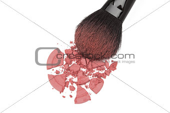 Crushed rouge with makeup brush