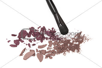 Crushed eyeshadow with makeup brush