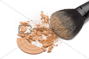 Crushed cosmetic powder with makeup brush