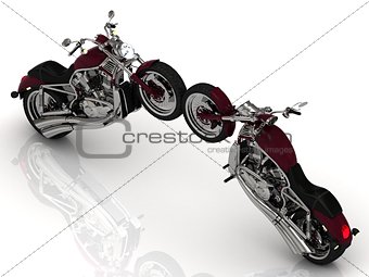 Two motorcycles standing wheel to wheel