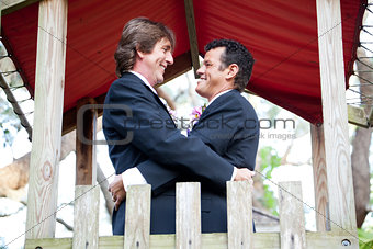 Happy Gay Couple Marries in the Park