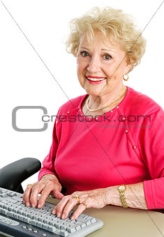 Senior Lady Using Desktop Computer