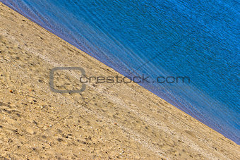 Sand beach and blue sea diagonal