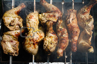 Grilled chicken Leg on the grill