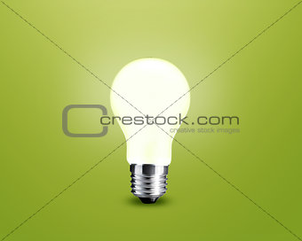 glowing Light bulb idea on green background