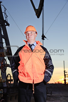 Worker in an oil field.
