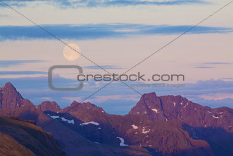 Moon over mountains
