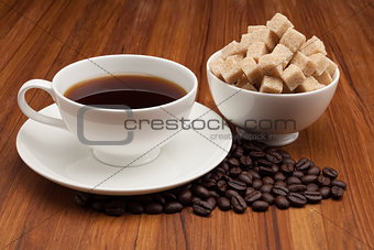 Coffee cup and saucer on a wooden table