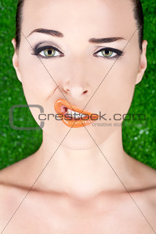 Fashion portrait of a woman pulling a strange face