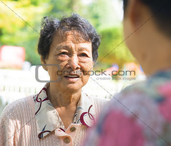 Asian senior women having conversation 