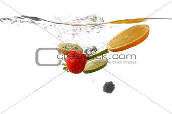 Fruits Falling Into Splashing Clear Water