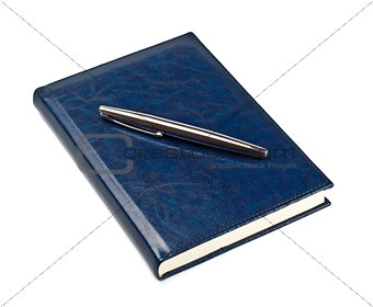 pen on closed diary
