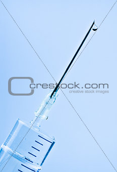 syringe with drop on needle