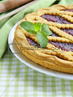homemade cherry tart of shortcake dough with jam