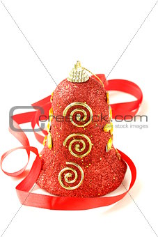 Christmas composition - red bell symbol of the holiday