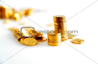 bright golden coins on white background
