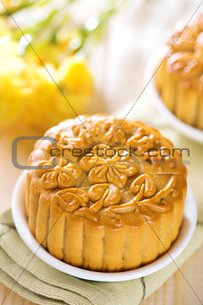 Assorted fruits nuts mooncakes on table