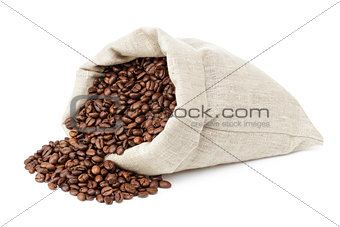 roasted coffee beans spill out of the bag