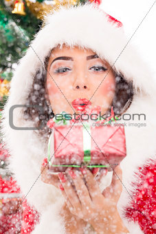 Santa girl blowing snow