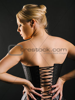 Beautiful blond wearing leather corset