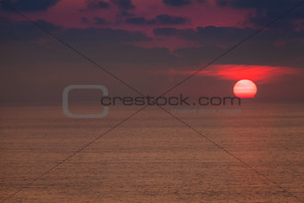 Red dawn over deep blue see