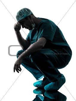 doctor surgeon man despair fatigue tired  silhouette