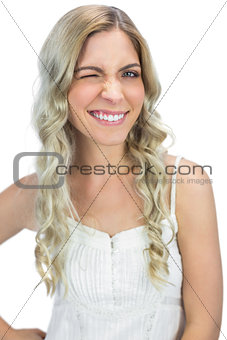 Attractive blond model winking to camera