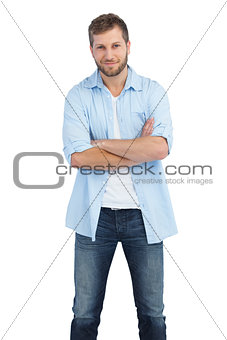Handsome man crossing arms