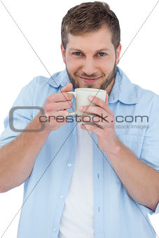 Casual model holding a mug