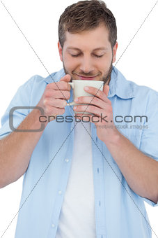 Relaxed casual model holding a mug