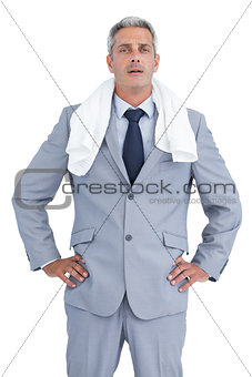 Sporty businessman with white towel