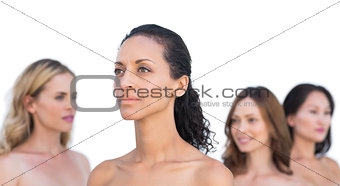 Peaceful nude models posing looking away