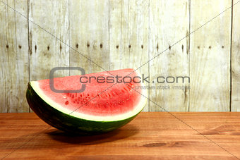 Fruit Sliced Sitting on a Wooden Surface