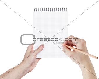 adult man hands writing something in notepad