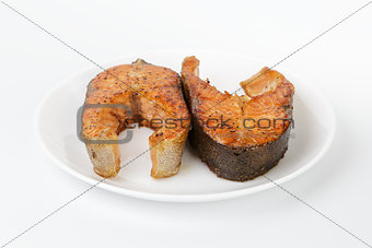 fried trout steaks on plate