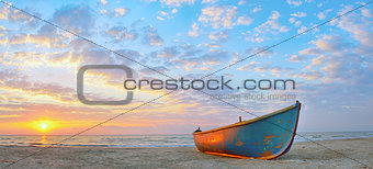 Fishing boat and sunrise