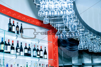 bar with drinks and glasses