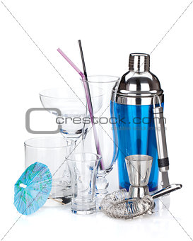 Cocktail shaker and various glasses