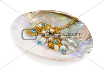 Blue topaz with pearls and gold