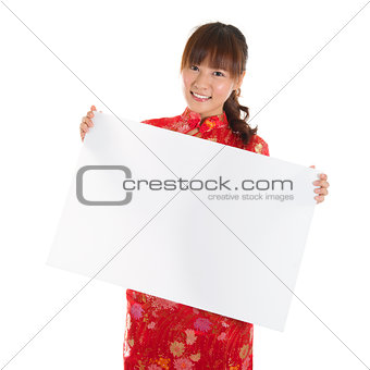 Chinese cheongsam girl holding placard