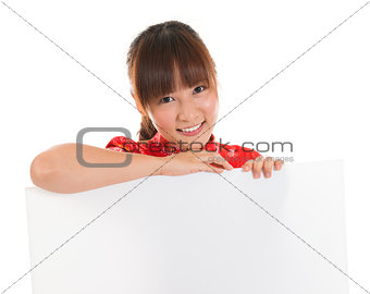 Chinese cheongsam girl holding white placard