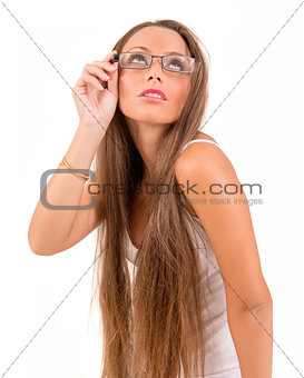 Beautiful woman with glasses looking up in a bwhite background
