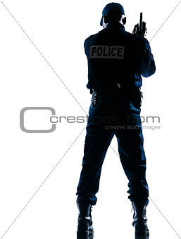Rear view of policeman with handgun