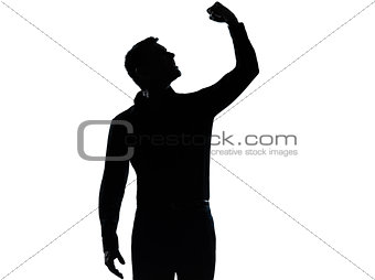 one business man angry fisting up silhouette