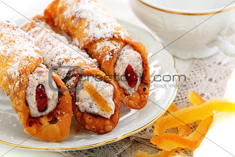 Cannoli with fresh ricotta and candied fruit.