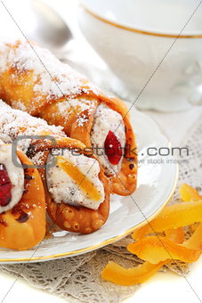 Cannoli and candied oranges. 