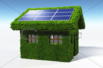 Grassy house with solar panels