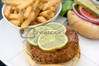 Crabcake Burger with French Fries Closeup Macro